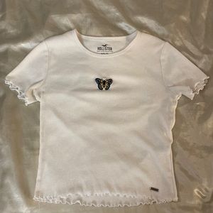 White baby tee w/ butterfly embroidered on the front